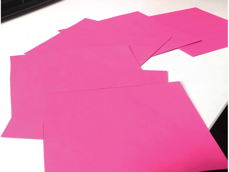 Pink paper cut into squares