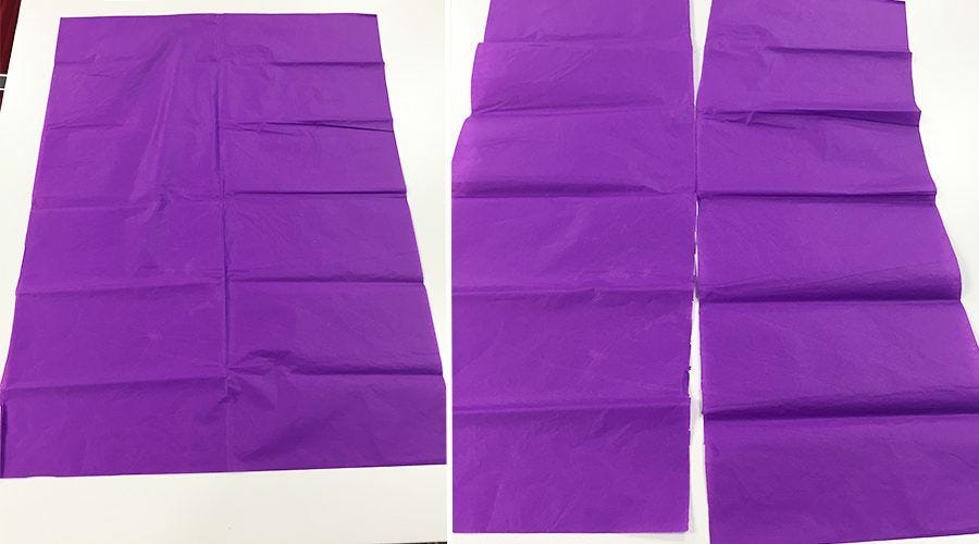 Purple tissue paper cut in half long ways, halves placed on top of one another