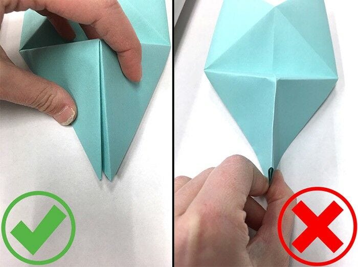 light blue paper folded paper wall art, diy wall art, paper art, how to make paper wall art,