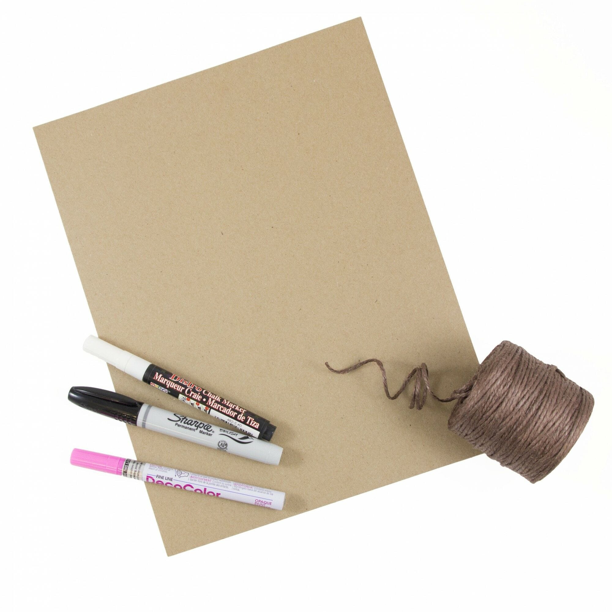 Materials for Last Minute DIY Halloween Costumes: brown kraft paper, twine, sharpie, and paint markers