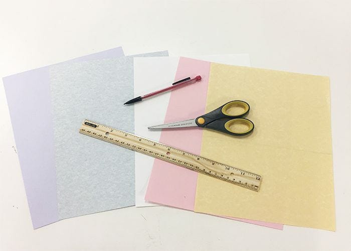 Colored paper, ruler, pencil, scissors