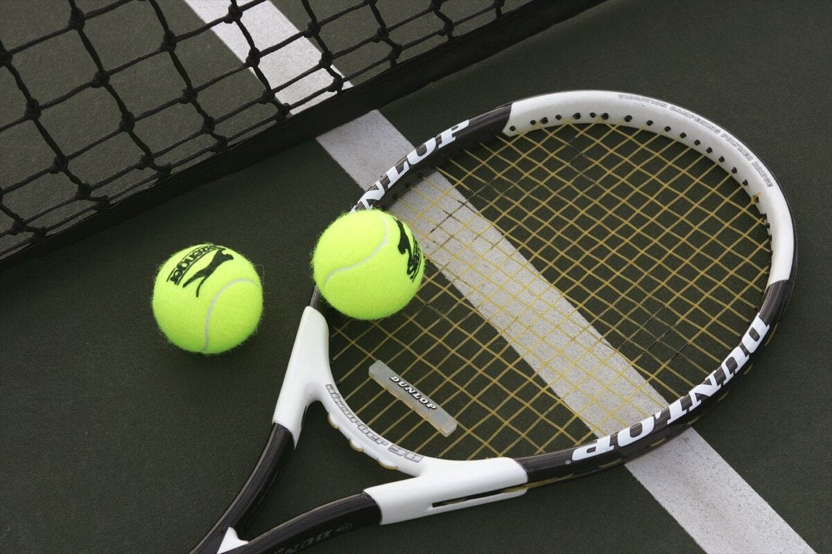 Tennis racket, two balls